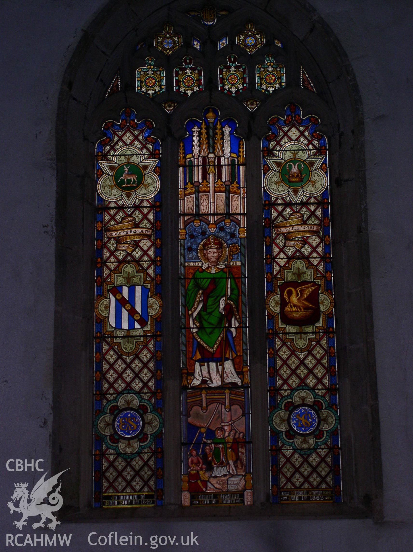 Colour digital photograph showing an interior view of a stained glass window at St Donat's Church, St Donats; Glamorgan.