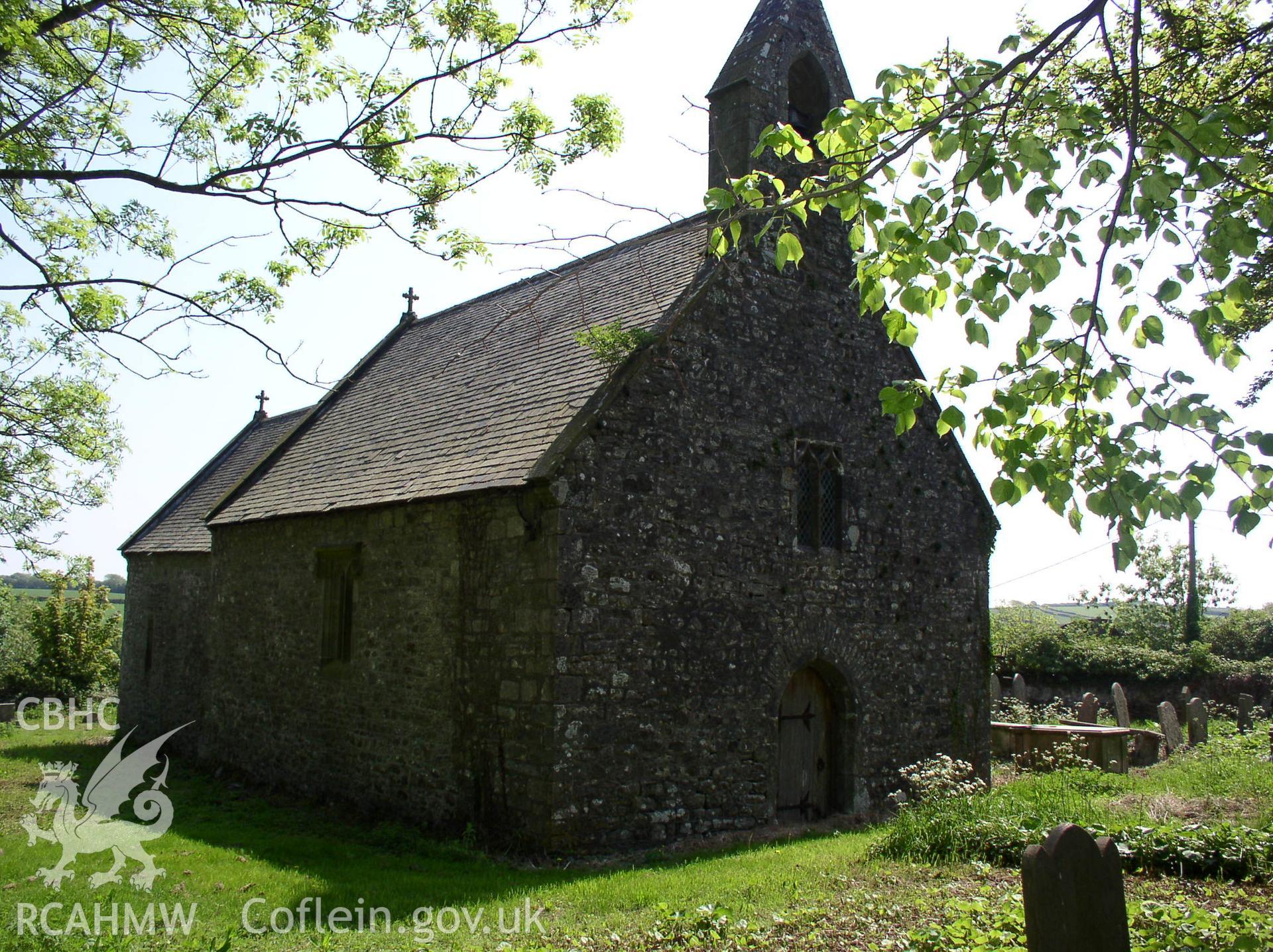 Colour digital photograph showing a three quarter elevation view of St Tydwg's Church, Tythegston; Glamorgan.